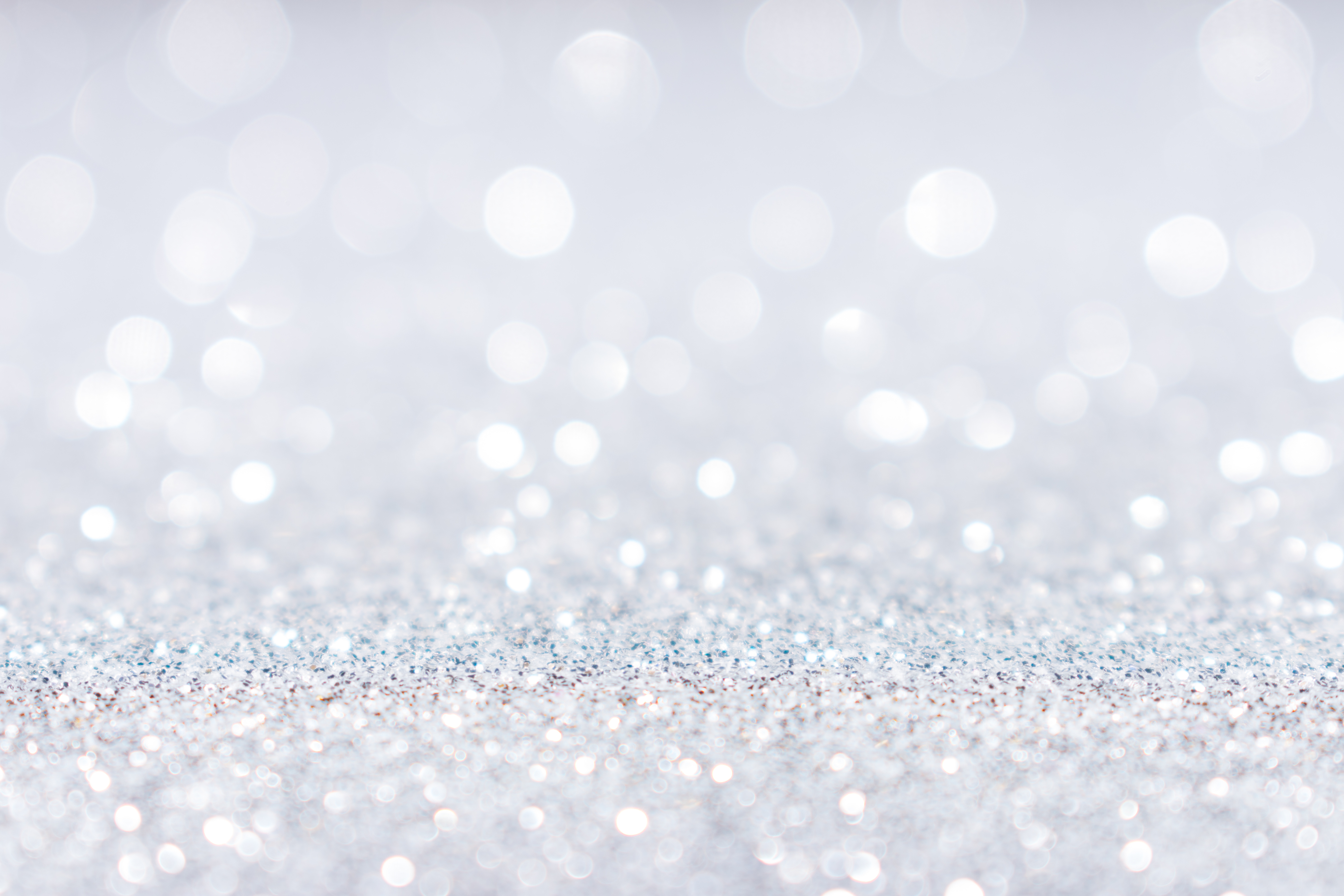 Abstract white silver glitter sparkle background.